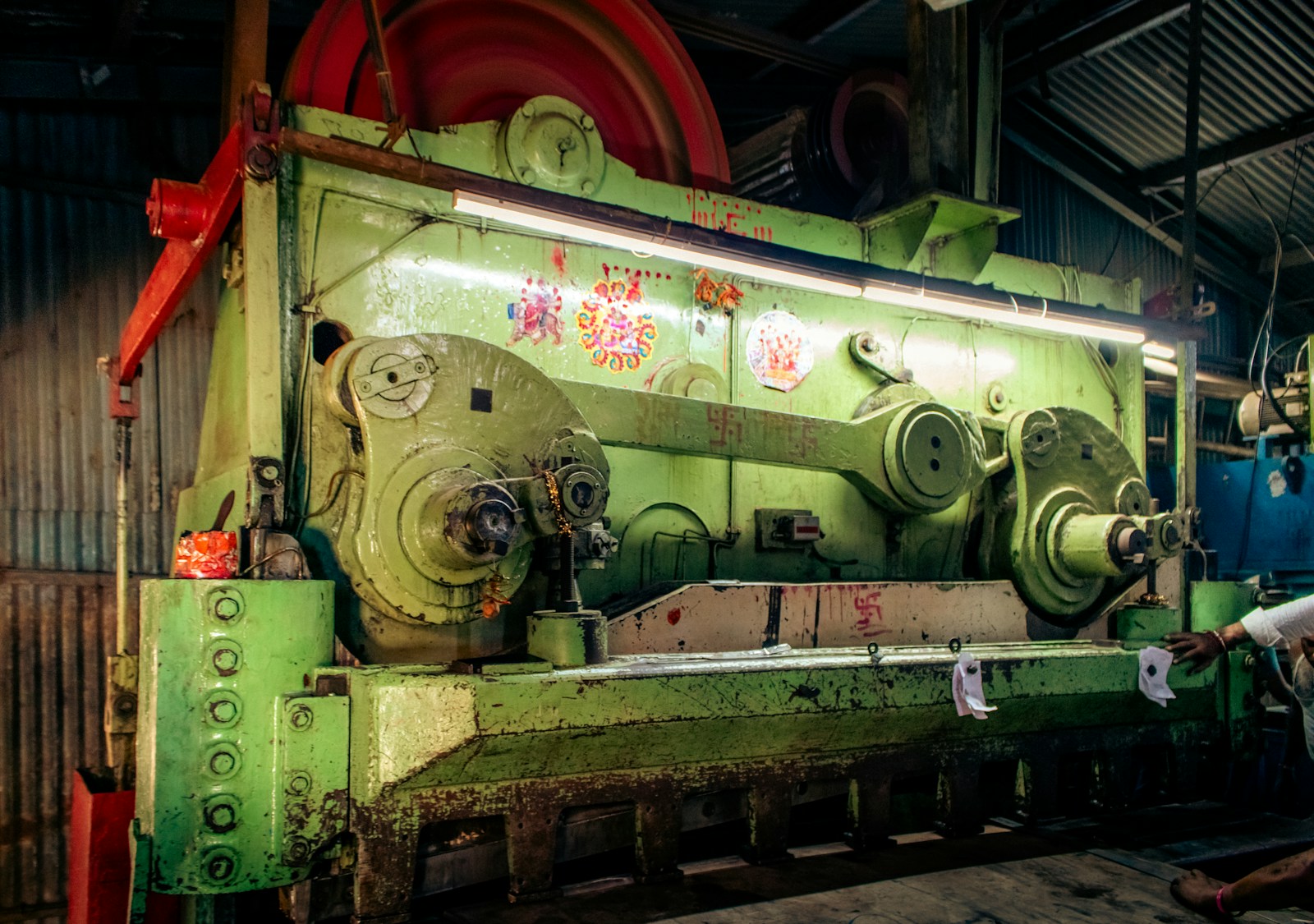Large metal-forming equipment in a workshop